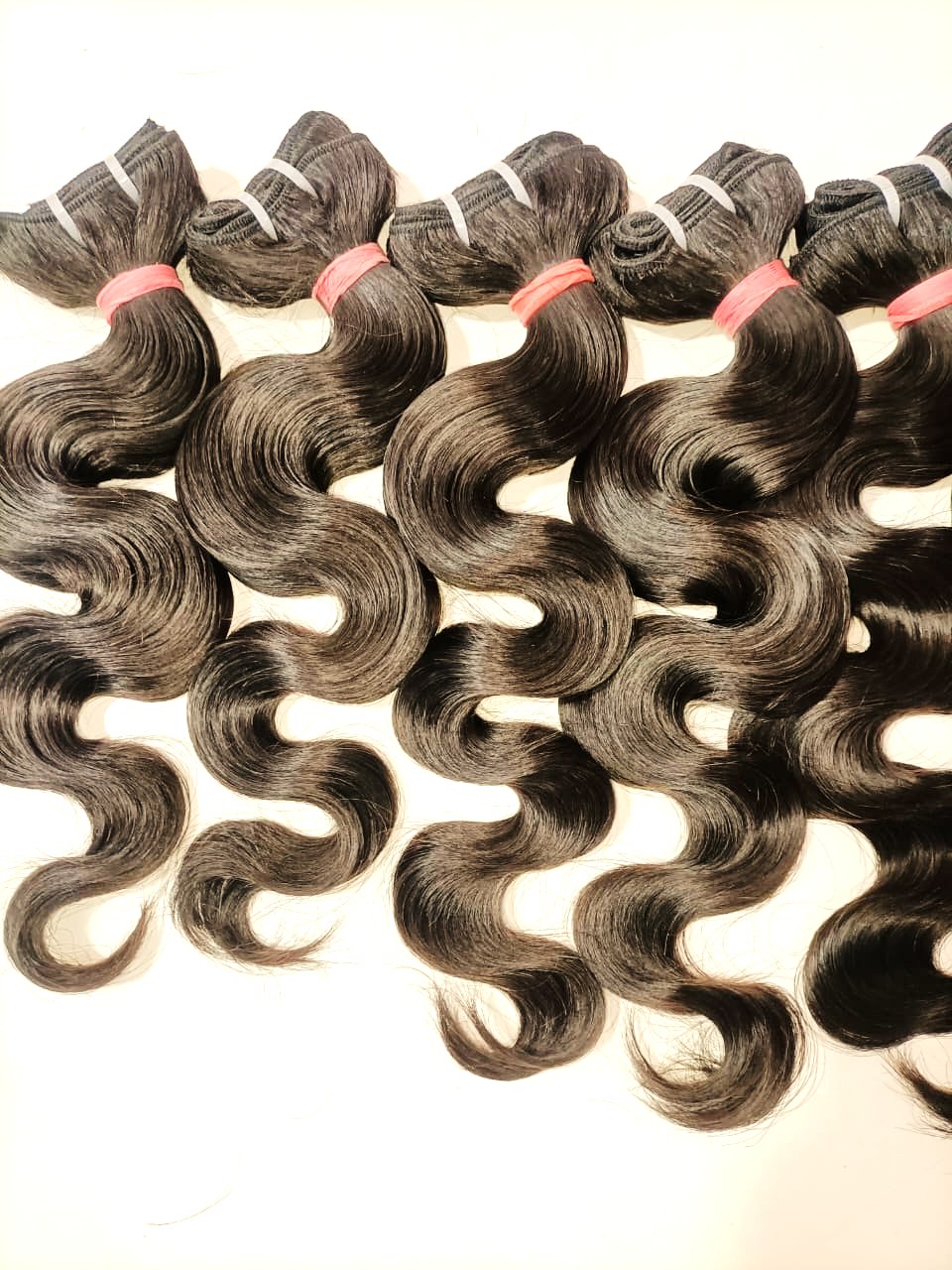 Wholesale human hair extensions and bundles by MG Hair India